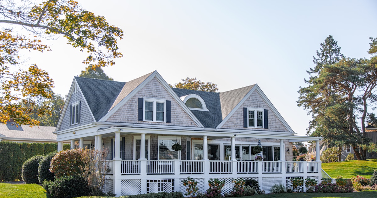 Residential home with visible gutter system along the roofline, the type of home where gutter sealant repairs prevent water damage